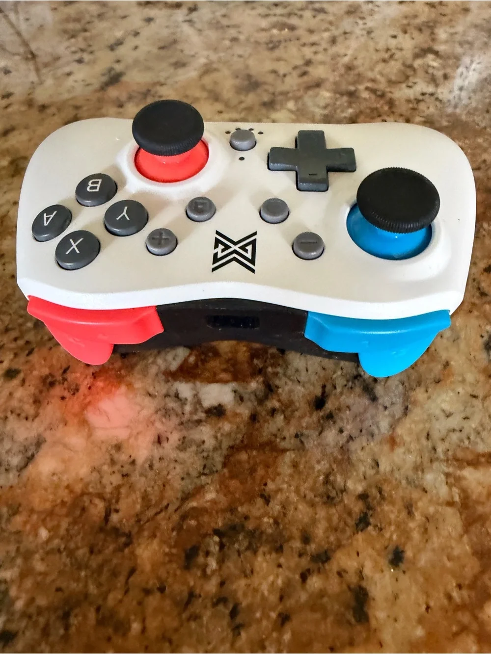 White Wireless Game Controller with Blue & Red Accents